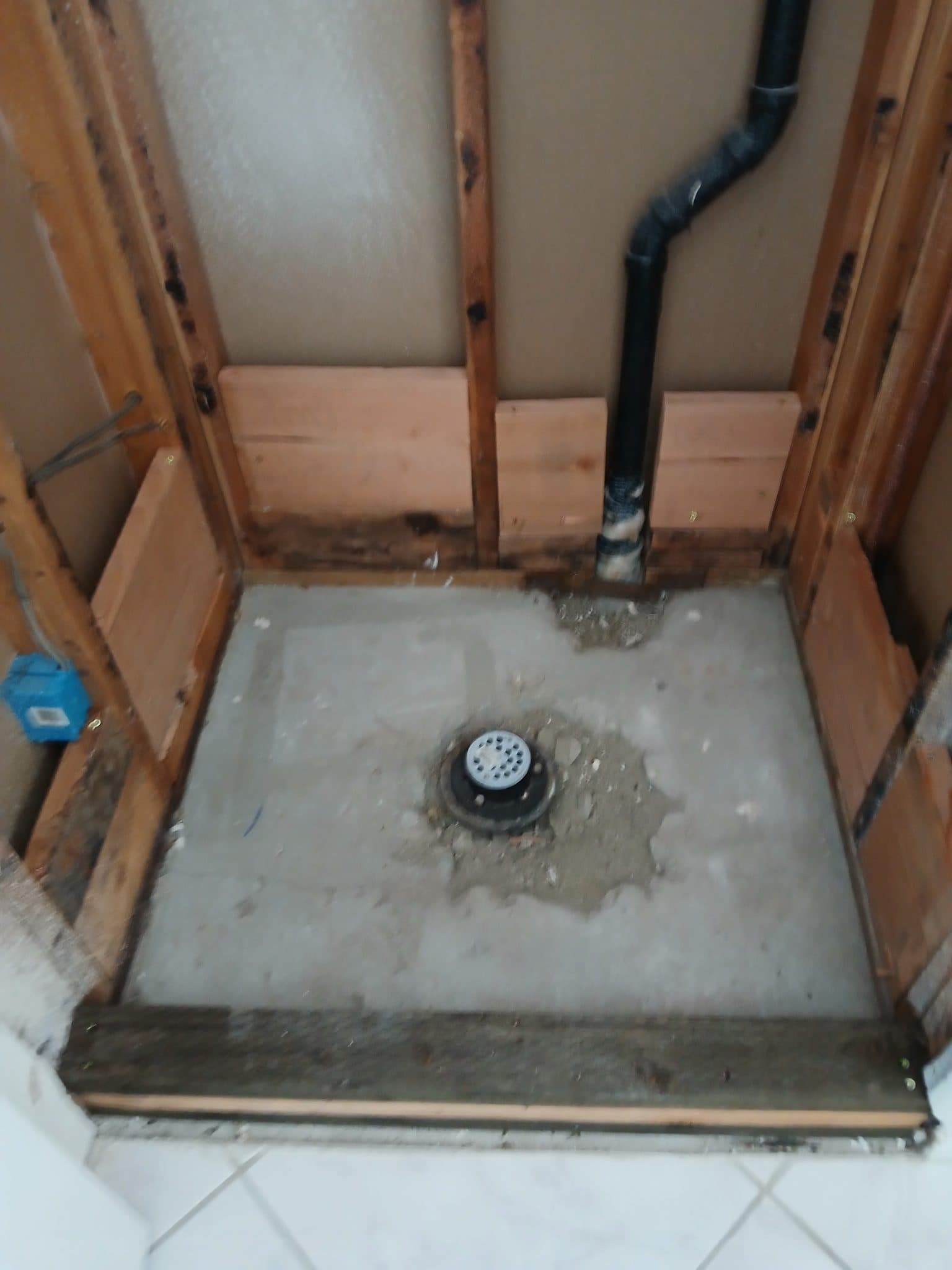 Water and fire damage preconstruction site in the Inland Empire, stripped to studs after mitigation — photo 1