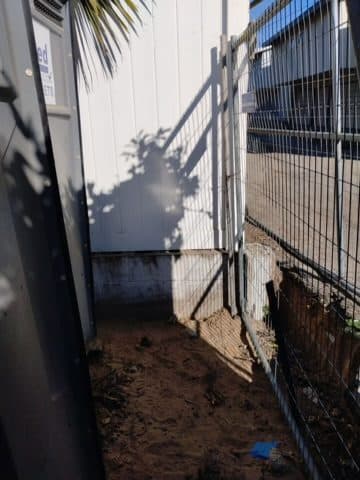 Water and fire damage preconstruction site in the Inland Empire, stripped to studs after mitigation — photo 3