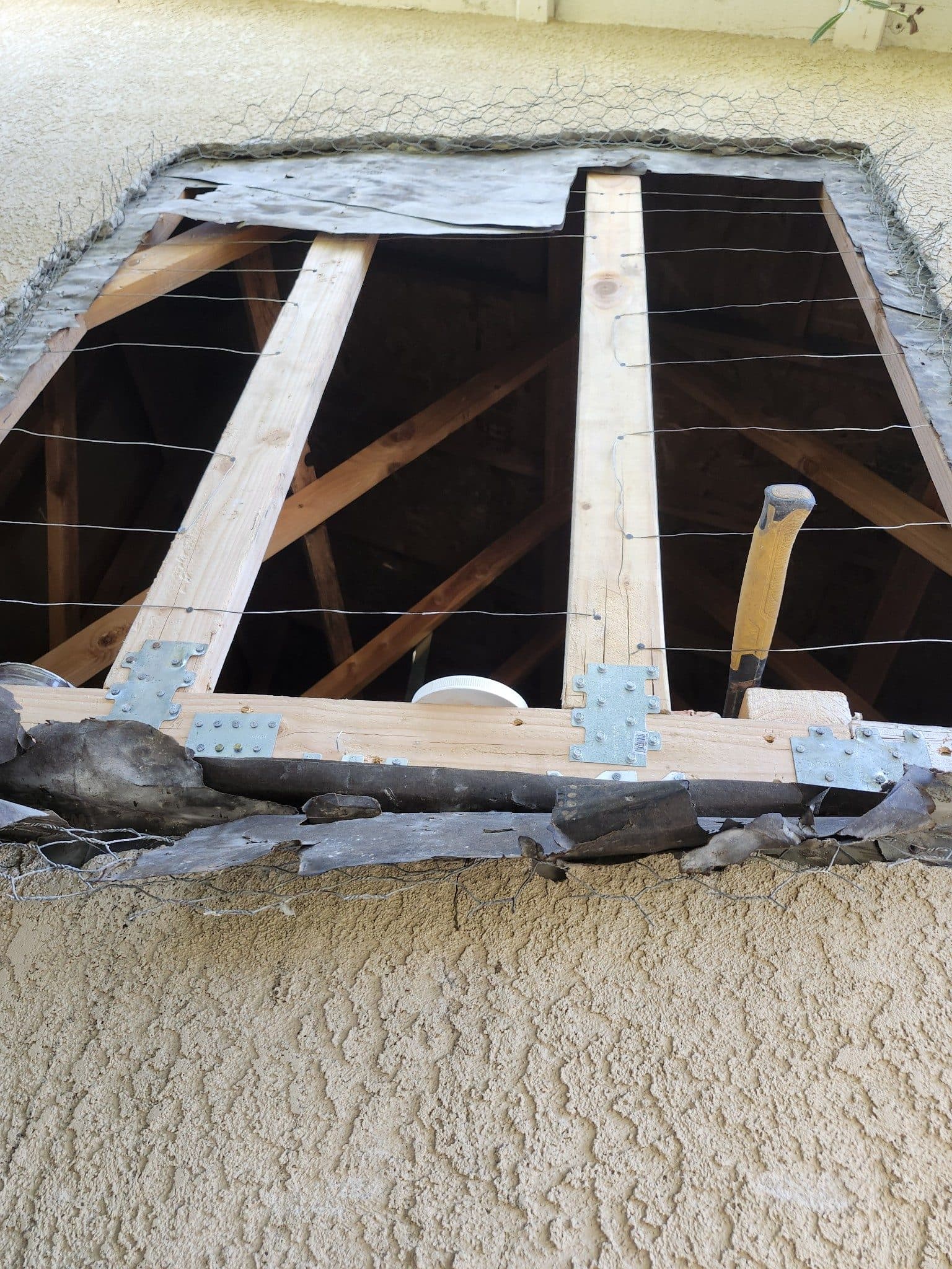 Water and fire damage preconstruction site in the Inland Empire, stripped to studs after mitigation — photo 4