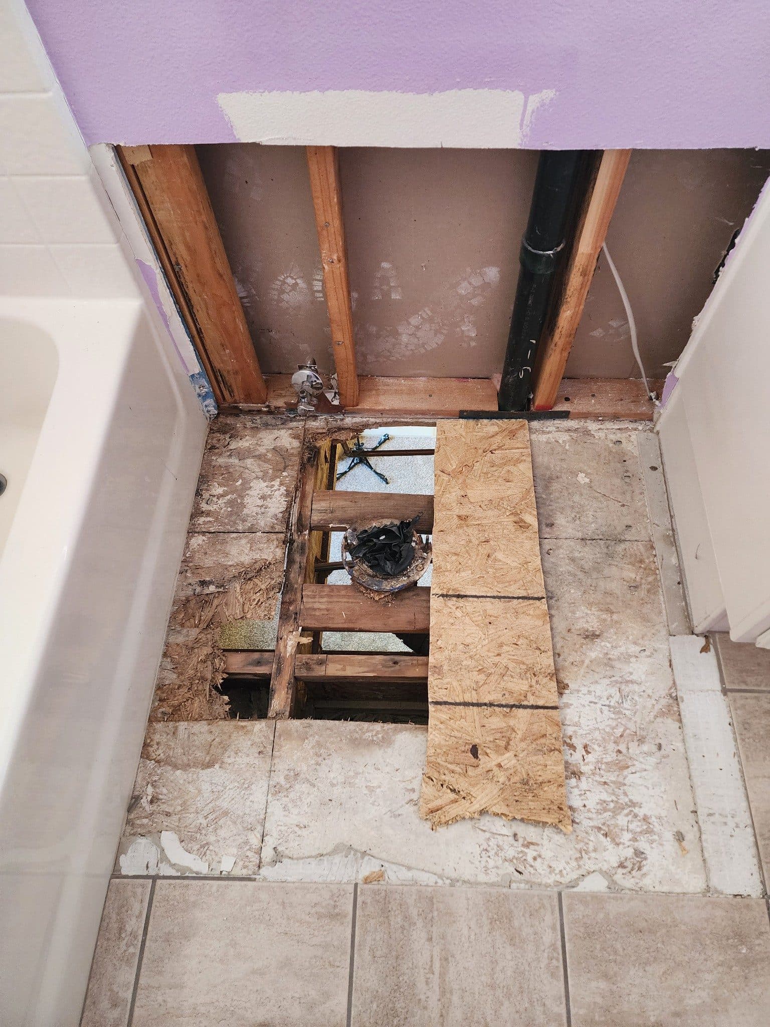 Water and fire damage preconstruction site in the Inland Empire, stripped to studs after mitigation — photo 5