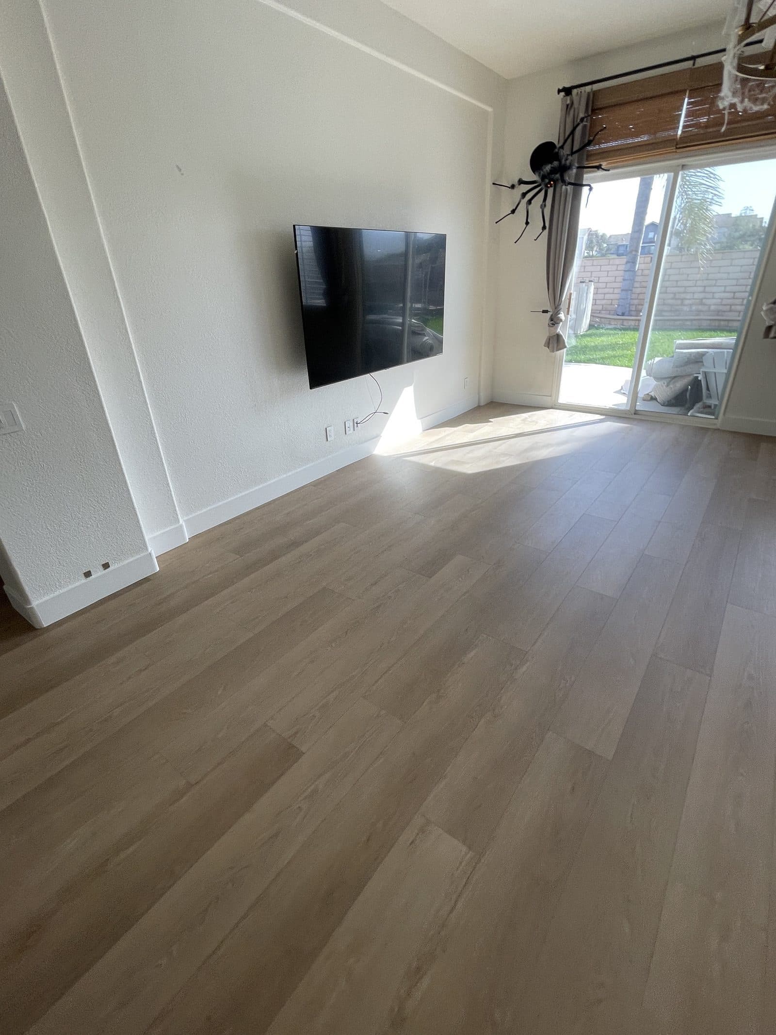 Completed kitchen rebuild in Corona CA with new cabinets, quartz counters and luxury vinyl plank flooring — photo 3