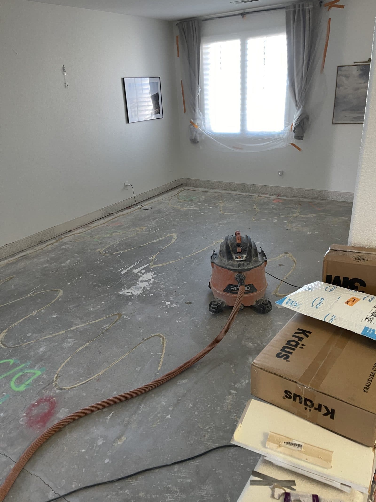 Water damaged kitchen in Corona CA stripped after mitigation, before insurance claim rebuild — photo 4