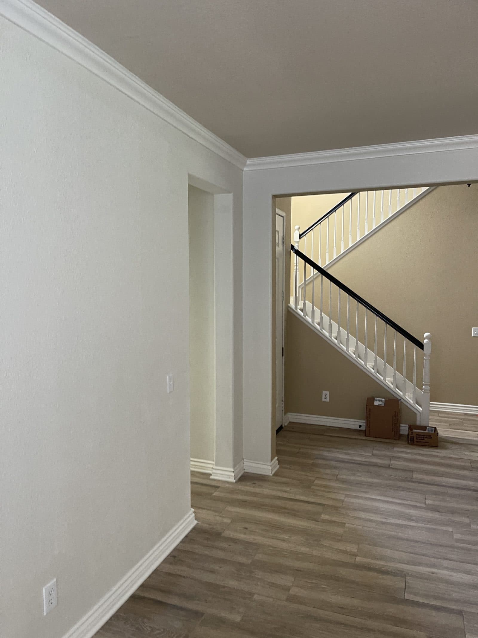 New luxury vinyl plank flooring installed in Corona CA home after water damage rebuild — photo 2