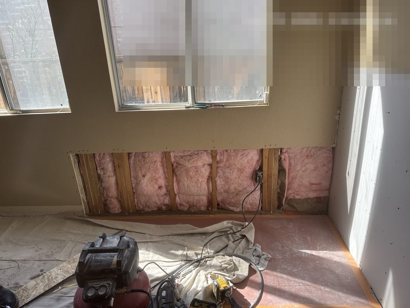 Water damaged wall opened to framing in Corona CA home before insurance claim repair — photo 4