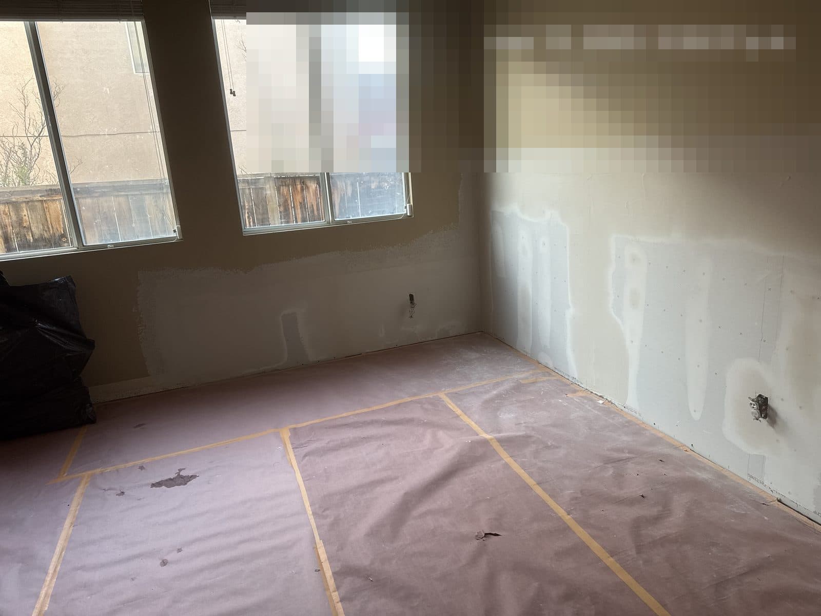 Water damaged wall opened to framing in Corona CA home before insurance claim repair — photo 5