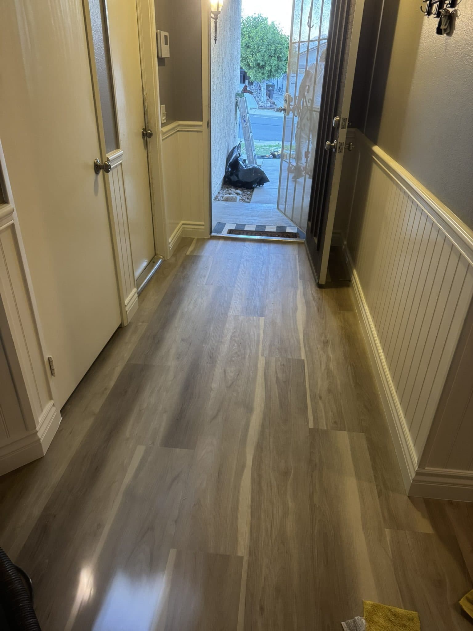 New flooring and finished interior in Riverside CA home after water damage insurance rebuild — photo 5